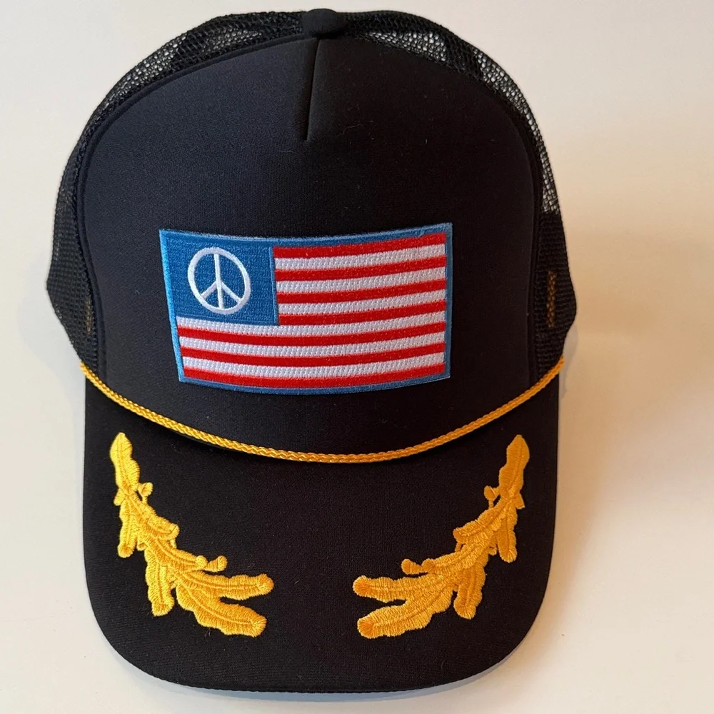 Ascot & Hart Vintage Black Trucker Hat with Gold Embroidery and Peace Flag Patch